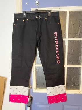 Black Straight Jeans with Pink Side Text and Patterned Cuffs